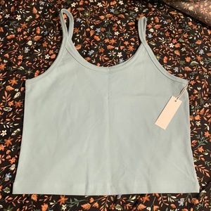 BNWT ARQ Crop Tank in shade ‘Baby’